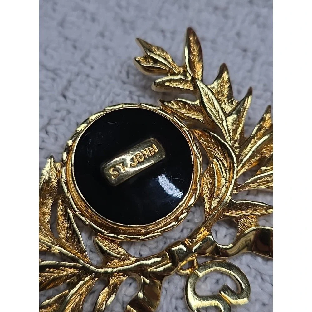 Rare Vintage ST. JOHN Maltese Gold Plated Black Enamel Dangle Logo Pin Brooch